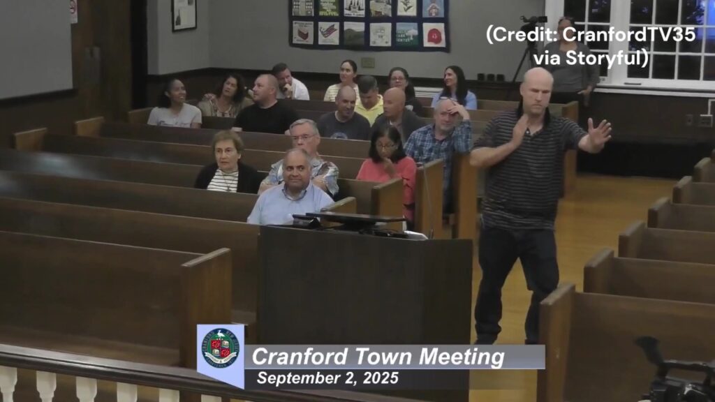 Council candidate dances at town hall protesting property tax hike