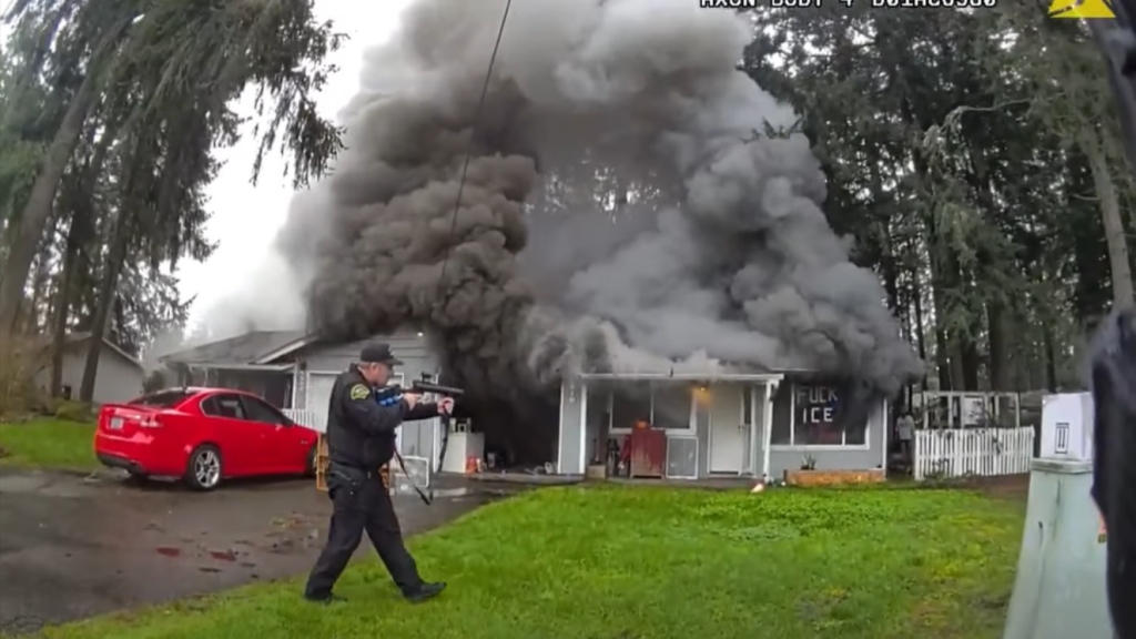 Bodycam video shows man wielding hatchet set home on fire during eviction Bodycam video shows man wielding hatchet set home on fire during eviction