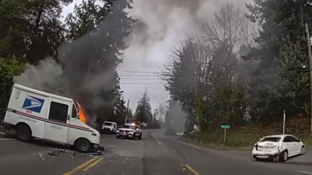 Bodycam shows Pierce County deputy rescues driver from burning mail truck after crash
