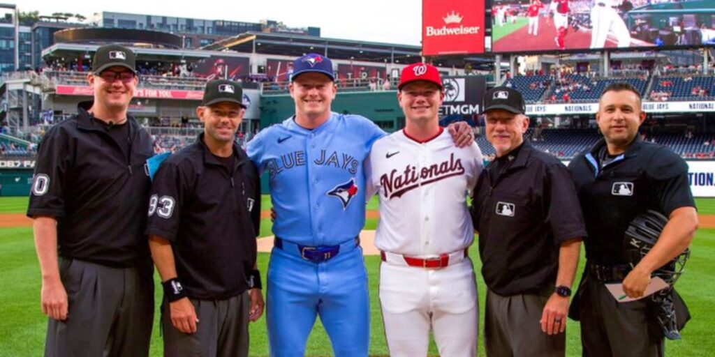 Gus and Louis Varland exchange lineup cards before Nationals vs. Blue Jays game