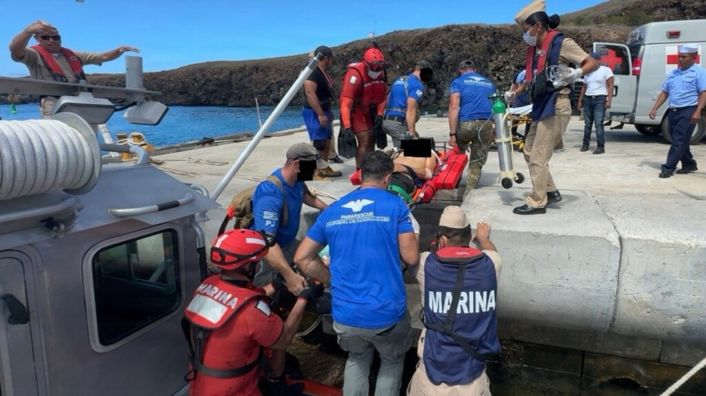 Pararescue team parachutes in for rescue 700 miles out at sea