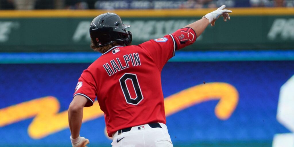 Petey Halpin celebrates 1st career home run by slapping hitting coach Grant Fink
