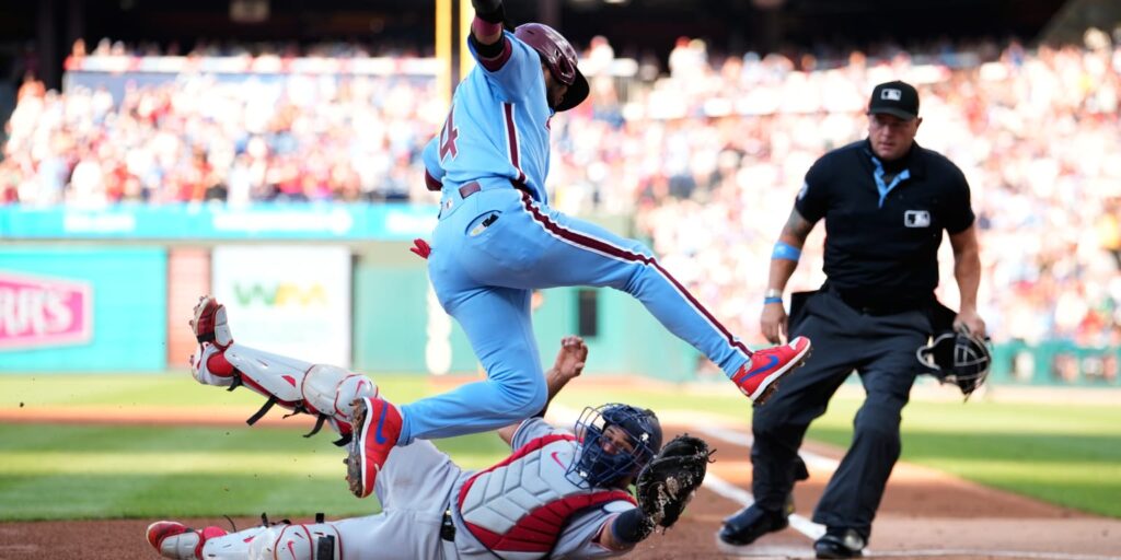 Luis Arraez avoids tag, but misses home plate