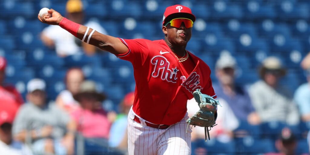 Phillies prospect Aroon Escobar throws his glove for an out