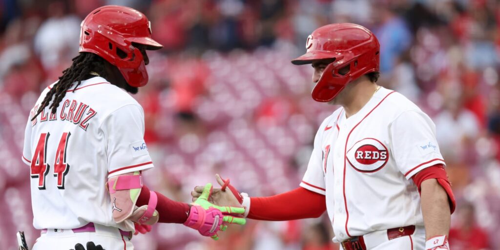 Reds hit four home runs, sweep Athletics at home