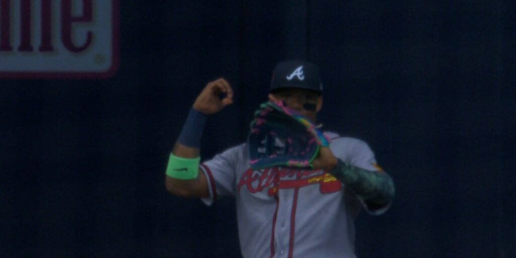 Ronald Acuña Jr. throws out Luis Lara at second base