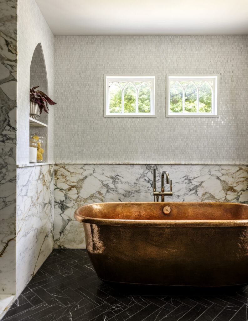 A Showstopping Bathtub Takes Center Stage in This Summit Home's Primary Suite