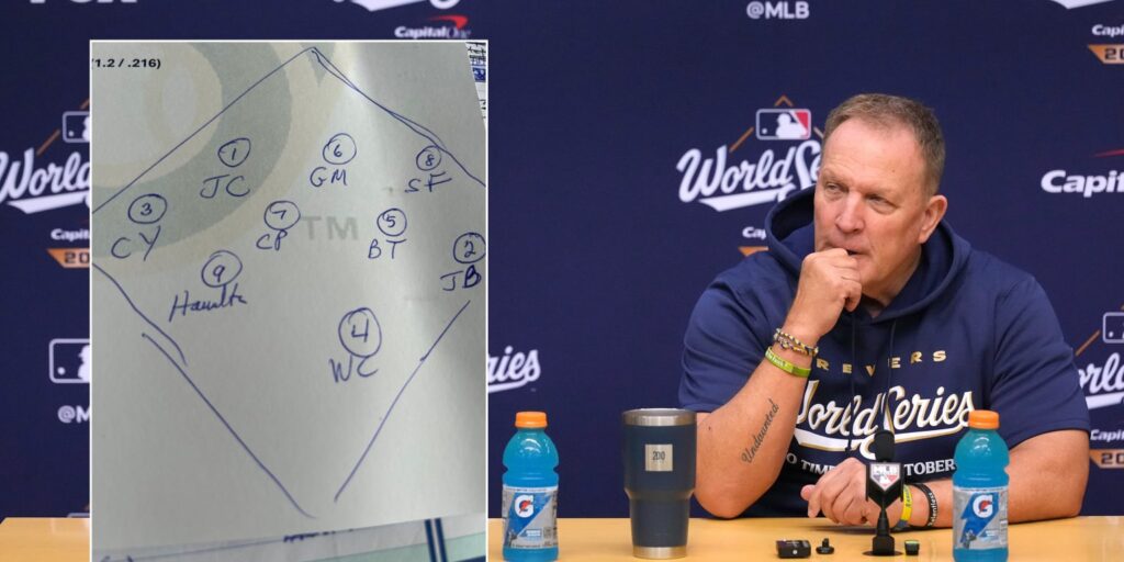 Pat Murphy draws out starting lineups on napkins